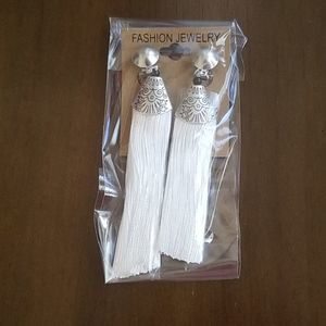 White and silver clip on tassle earrings